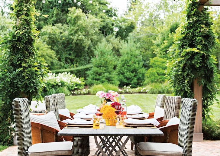 Bistro-lights-woven-tightly-through-patio-pergola-cast