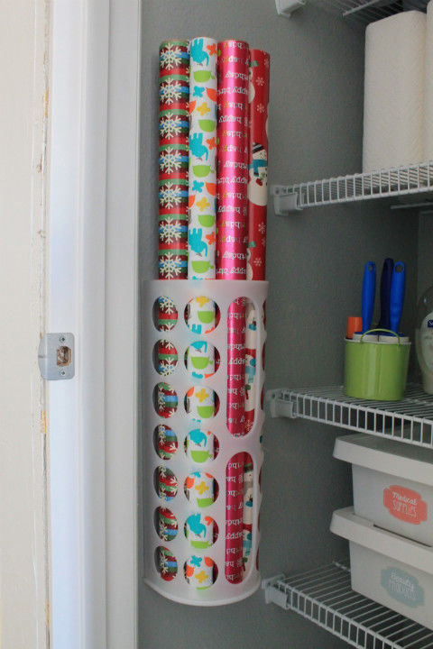 gallery-1447188585-utility-closet-wrapping-paper-storage