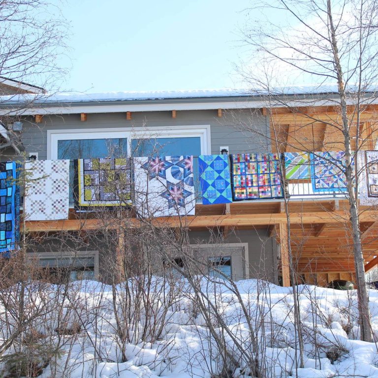 21033963_web1_200325-SIN-STANDALONE-national-quilt-day-quilters_2