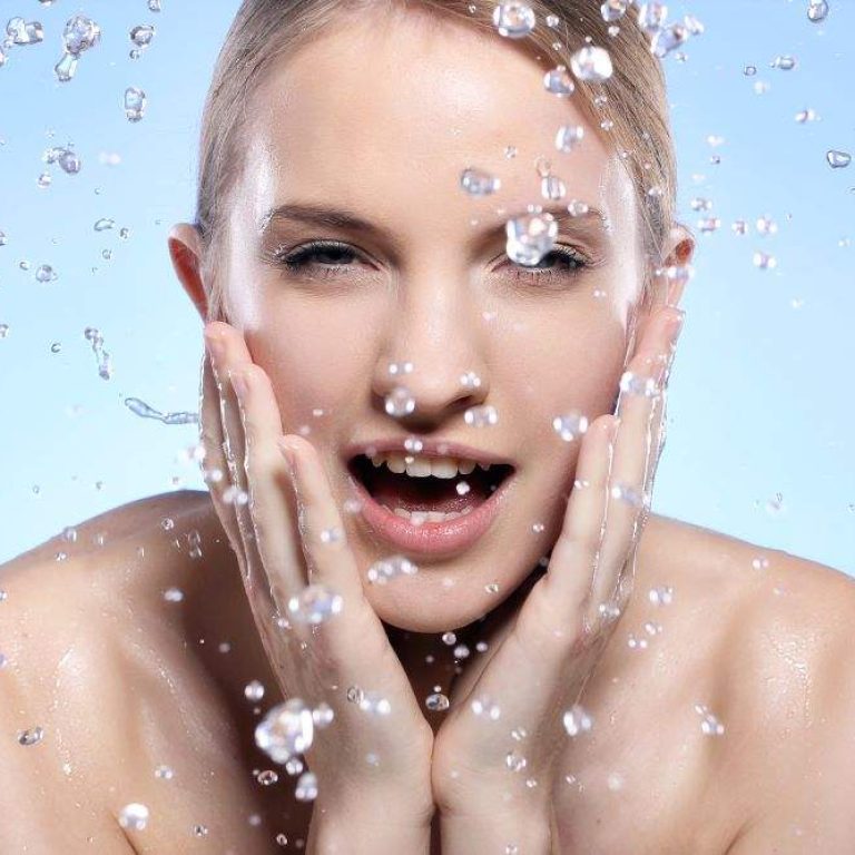 beautiful-woman-washing-her-face