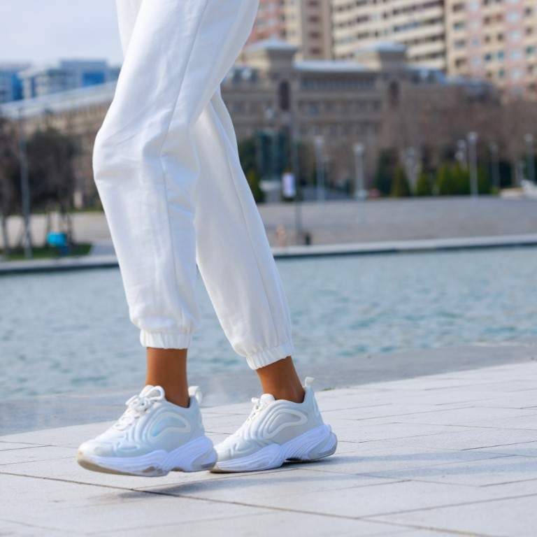 Female walking at the park. High quality photo