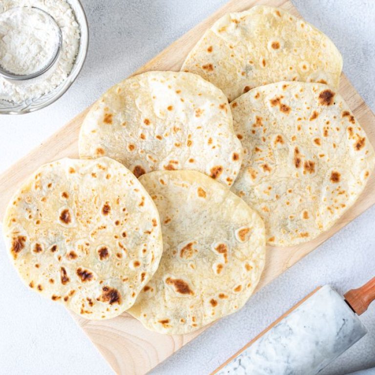 homemade-wheat-tortillas-pita-bread-tortilla-pita-with-ingredients-cooking-white-table-top-view