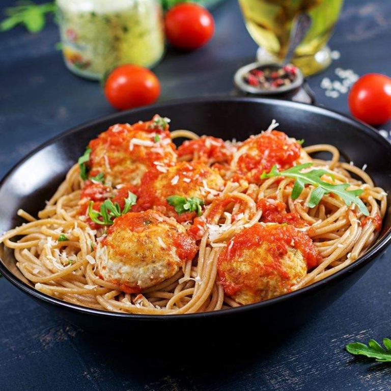 italian-pasta-spaghetti-with-meatballs-parmesan-cheese-black-plate-dark-rustic-wood-background-dinner-slow-food-concept