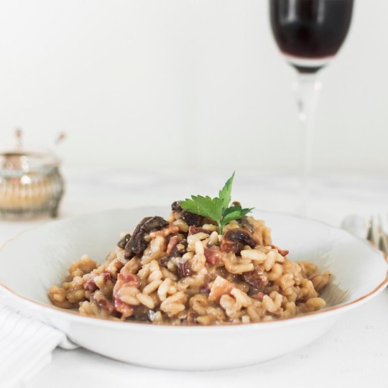 risotto-with-mushrooms-coriander-leaves_23-2147925970