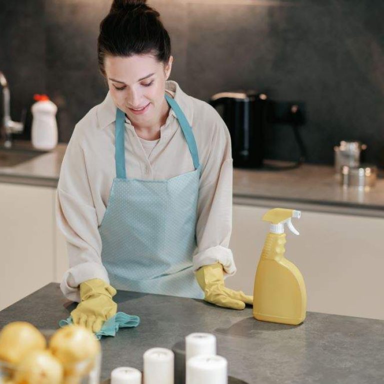 young-dark-haired-woman-looking-busy-while-doing-housework